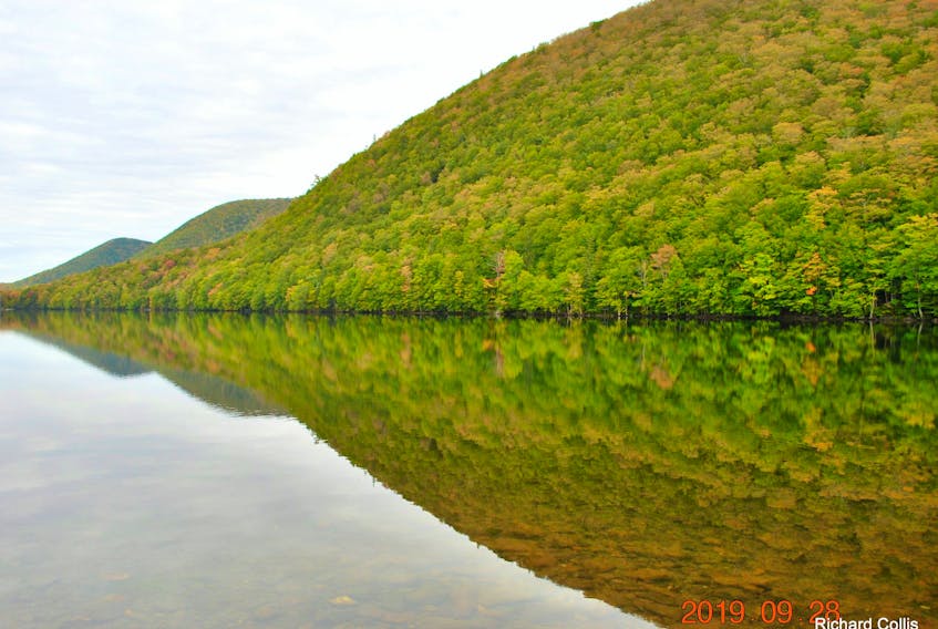 The show is underway in Cape Breton! We're starting to see some colour in the higher latitudes and greater elevations. Richard Collis wanted to share this stunning view of Lake O' Law.  This lovely gem of a lake is in the Lake O' Law Provincial Park - the only provincial park in Inverness County. You'll find it 24 km north of Highway 105 on the scenic Cabot Trail on Cape Breton Island.