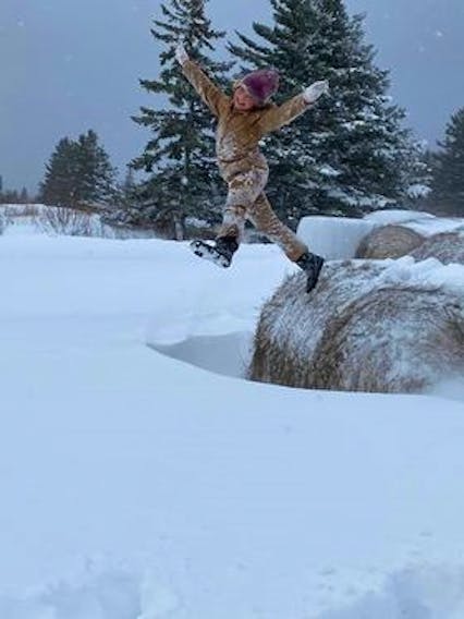 I don't see this enough – kids playing outside. In the winter, it can be difficult to find things to do - until you get 30 cm of snow.  Amy Lynn Langlois' timing was perfect.  She caught Lexus Mazie in mid-air in Port Lorne, N.S., Monday morning.  Yes, that's a bale of straw!  Snow and the farm, now that would make me jump for joy too!