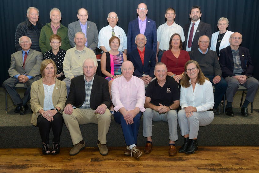 The P.E.I. Sports Hall of Fame recognized its 50th anniversary Saturday by presenting members with a special pin. Members, front row, from left, are Kim Dolan, Gerard Smith, Vince Mulligan, Paul Arsenault and Lorie Kane. Second row, Paul H. Schurman, Susan Dalziel, Clarkie Smith, Debbie MacMurdo, Bobby Dowling, Barb McNeill, Clair Sudsbury and Bob Barwise. Third row, Billy MacMillan, Gordie Whitlock, Lothar Zimmermann, Gerald Keough, Peter MacDonald, Armand Martin, Kevin O’Brien and Cathy Dillon.