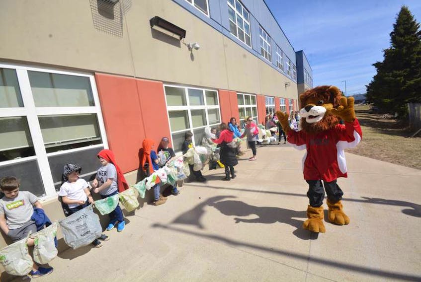 Cheered on by the school mascot Roary, the students of West Highlands Elementary learned they could circle around their school almost 13 times with the number of grocery bags they collected when they participated in a recycling challenge.