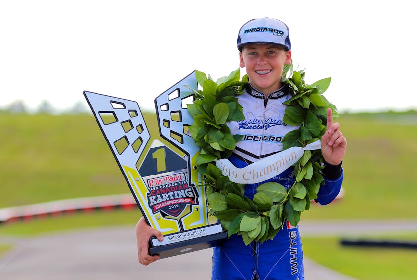 Landen White of Joggins holds the Briggs Jr. Lite championship trophy after winning the title at the Canadian Karting Championships in Bowmanville, Ont. on Aug. 18. Cody Schindel-CanadianKartinNews.com photo