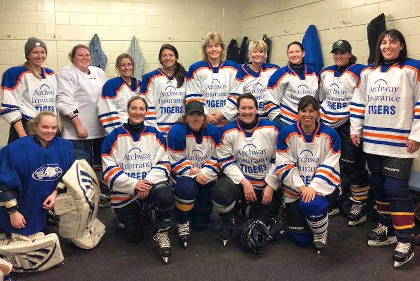 The Archway Insurance Tigers won two games in two nights, one over the Cougars, and one over the Lions. The Tigers are: (front, from left) Goalie Kat Aube, Andrea Faryniuk, Lynn Mackay, Colleen Bateman, Donna Canton-Scott, (back, from left) Jasmine Richard, Danielle Robichaud, Jodie Wood, Ericka Webb, Stacey Webb, Leslie Belyea, Lise Leblanc, Jolyane Lavalle, and Lisa Morris