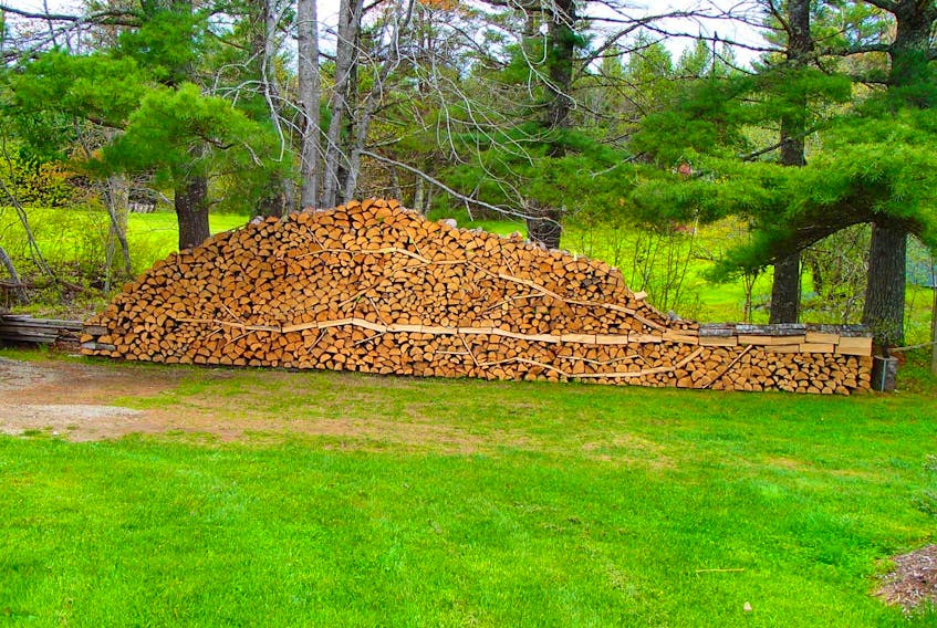 Marcel Ouellette of Halifax and Mill Village won an international contest in 2019 with this piece of woodpile art.