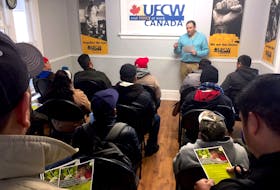 Santiago Escobar, a national representative for United Food and Commercial Workers Canada, is seen facilitating a workshop for migrant farm workers in this submitted photo. UFWC Canada released a report Monday, calling for reforms at the federal and provincial levels to better protect migrant workers in Canada.