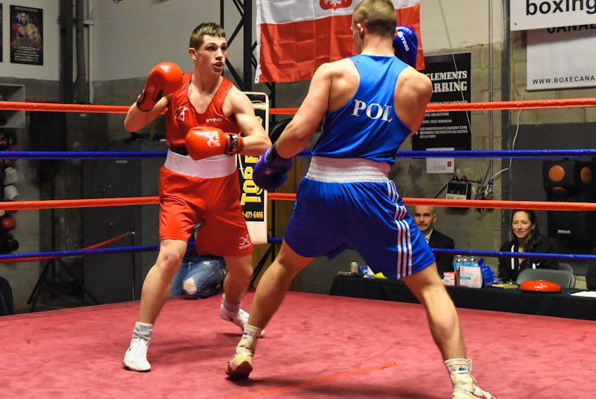 Nova Scotia boxer Wyatt Sanford, left, takes on Karol Kowal from Poland during an amateur bout in January. Sanford, of Kennetcook, is headlining two fight cards this week, Friday night at East Hants Sportsplex in Lantz and Sunday afternoon at Findley Park in North Noel Road. (BOXING CANADA)