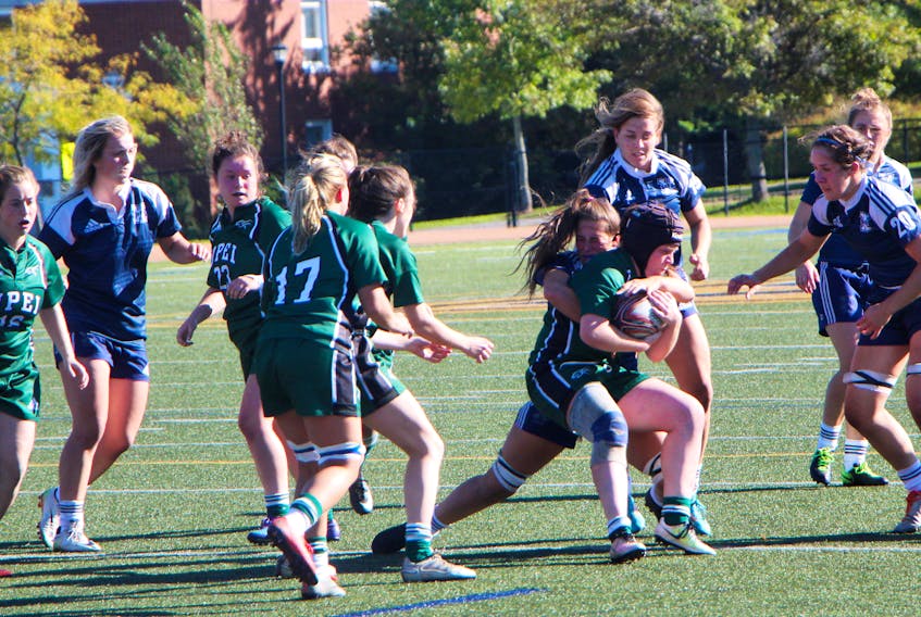 St. F.X. X-Women rugby team pictured defending against UPEI in last season action at Oland Stadium. The X-Women open their 2018 regular season at home versus the St. Mary's Huskies, Sept. 7, starting at 7 p.m. File