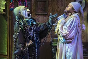 Puppeteer Simon Henderson, performing as the ghost of Jacob Marley, and Rhys Bevan-John, playing Ebenezer Scrooge, run through a scene during the media call for Dickens’ A Christmas Carol on Nov. 28. The longstanding holiday classic will run until Dec. 27 on Neptune’s Scotiabank Stage.