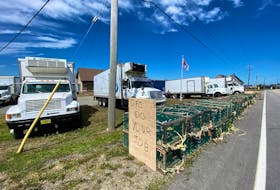 Seafood company trucks have been parked in front of the DFO detachment in Meteghan, Digby County, with signs that read: DFO do your job. TINA COMEAU PHOTO