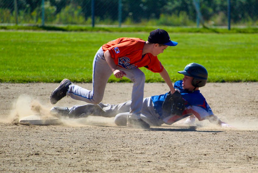 Yarmouth’s Cameron Barnes slides into second base during a Saturday afternoon game against Halifax, part of this past weekend’s 13U AAA baseball provincials, hosted by the Chris Scott Construction Peewee AAA Gateways.