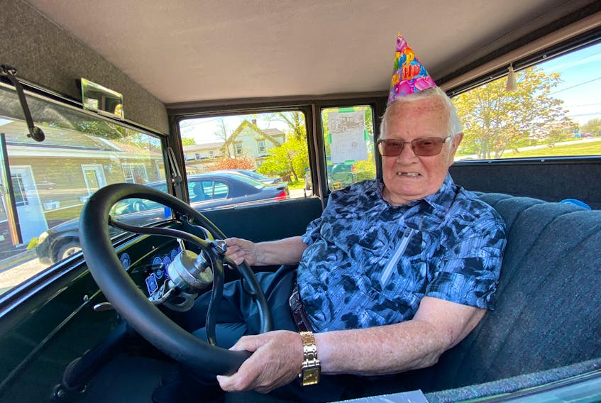 Yarmouth resident George Atkins sits inside a 1927 Model T Ford on his 96th birthday. Some family and friends made it a special day for the Second World War veteran, including by asking some antique auto car owners to do a drive-by. One stopped for a closer visit. TINA COMEAU PHOTO
