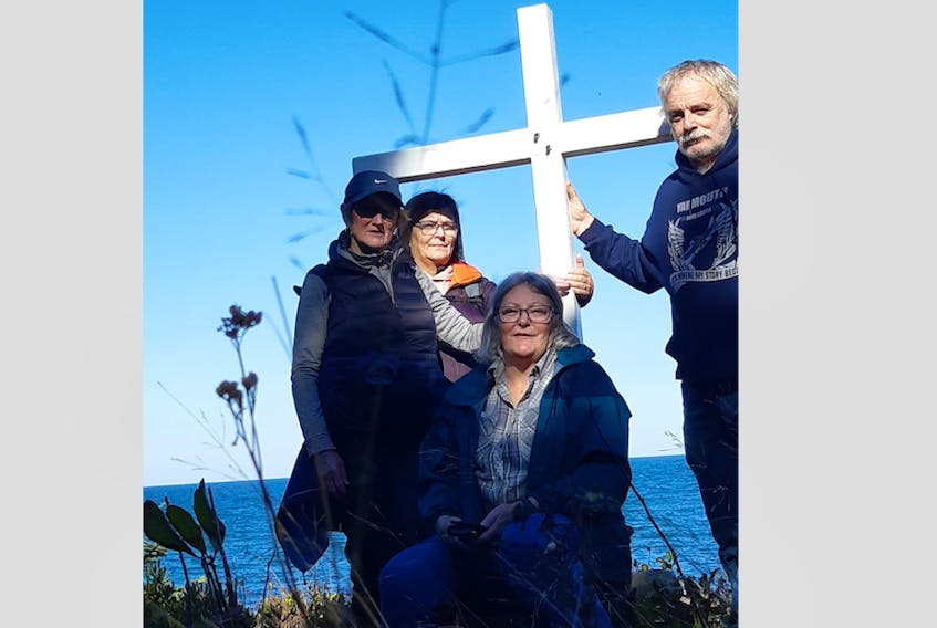 Betty Jean Peters-Meuse, Kathy Melenchuk, Andrea Crosby and Emery F. Peters at the site of the memorial in Digby County that remembers the 1946 sinking of the Robert G. Cann steamer. CONTRIBUTED
