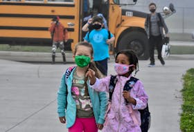 Students arrive masked at Yarmouth Elementary School for the first day of the 2020-2021 school year, which because of the COVID pandemic saw an opening day unlike any other. For students returning to school, Sept. 8 was their first day back in the classroom since leaving for March Break during the last school year. Students never returned to the classroom. TINA COMEAU PHOTO