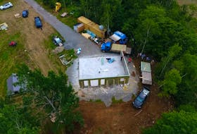 The walls starting to go up on the Gilbert's Cove home. The process of putting up the exterior walls and roof took roughly 12 hours. PHOTO COURTESY JD COMPOSITES