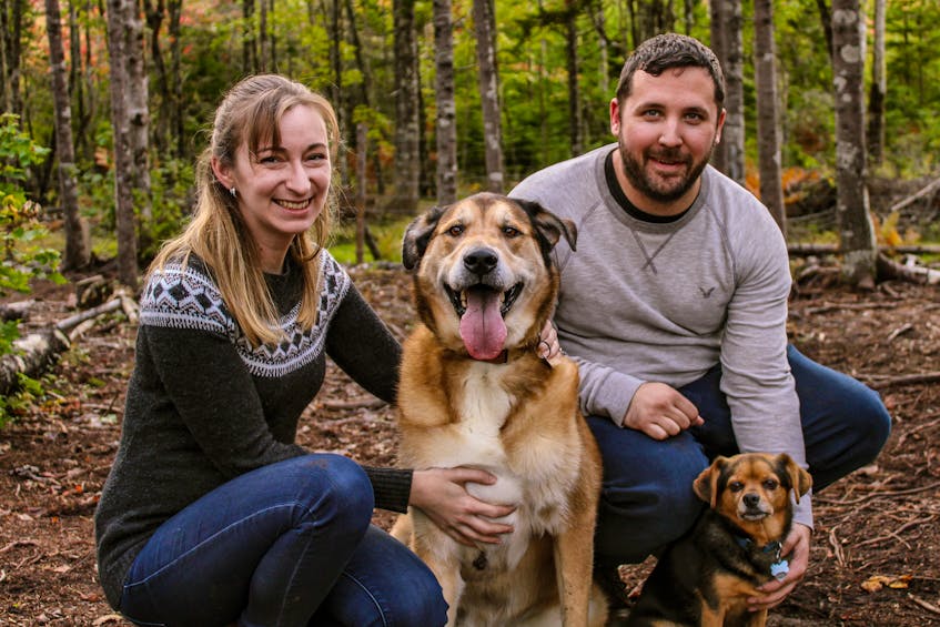 Mile East Productions owners Candice Phibbs and Rick Allwright with their dogs Dover and Cooper.