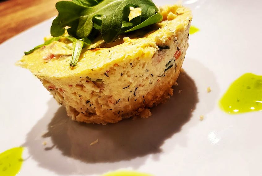 Gaia Global Kitchen offers lobster cheesecake with arugula & chive oil.