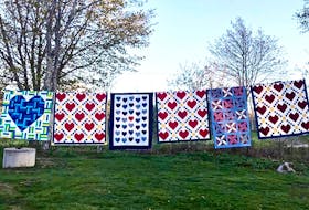 As the 430+ quilts arrived from across the nation over a nine-week period , the president of the Maritime Modern Quilt Guild hung them in groups on her clothesline to let quilters know their contribution had arrived safely.