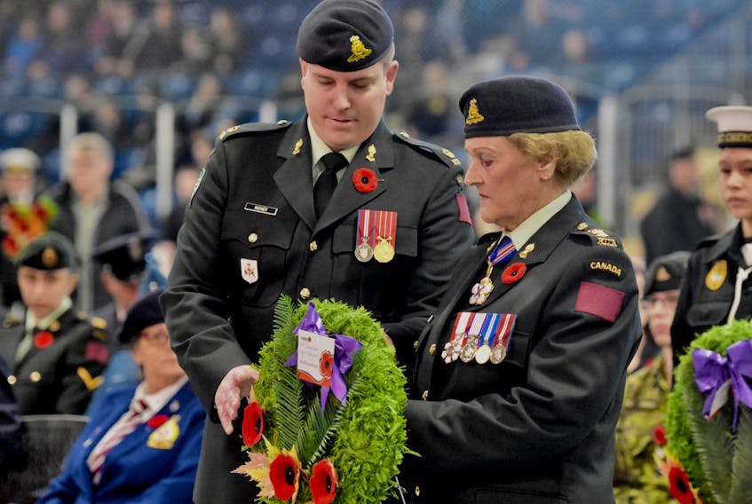 Irene d’Entremont of Yarmouth, an honorary colonel of the 84th Independent Field Battery, and Major Stephen Misner, Battery Commander of the 84th Independent Field Battery, lay a wreath during the Remembrance Day ceremony at the Mariners Centre. TINA COMEAU PHOTO