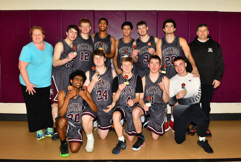 The Yarmouth Consolidated Memorial High School varsity boys basketball team after their tournament victory over the weekend in Springhill.