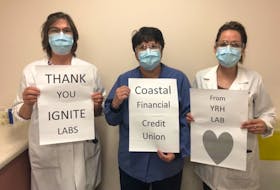 Yarmouth Regional Hospital medical laboratory assistants Lori Penney, Melissa Deveau and Laura Amirault show their appreciation to Ignite Labs for ear savers to wear with their masks and to Coastal Financial Credit Union for covering Ignite's costs for producing the ear servers for health-care workers in southwest Nova Scotia. CONTRIBUTED