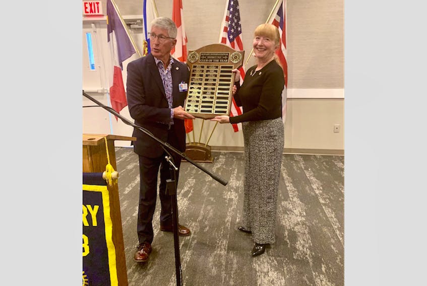 Rob Christie, Rotary district governor, and Linda Deveau, president of the Rotary Club of Yarmouth. Christie – a member of the Rotary Club of Pictou – presented the Yarmouth club with the award for 2018-2019 club of the year for Rotary District 7820.