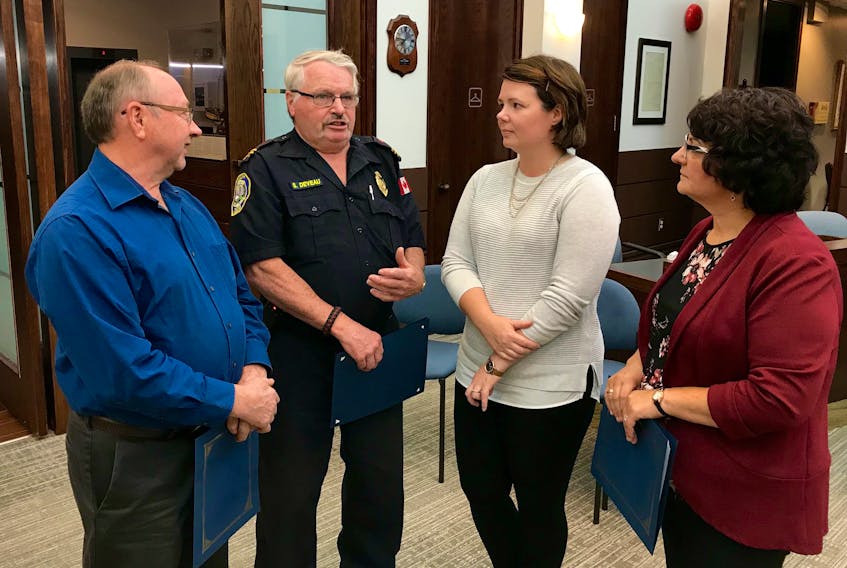 From left: Brian LeBlanc, Stewart Deveau, Angie Greene and Cindy LeBlanc were among those attending an Oct. 9 reception at Yarmouth town hall.  The event recognized local businesses for letting employees who are firefighters respond to fire calls while at work. The two LeBlancs and Deveau accepted certificates of appreciation on behalf of their businesses or employers. Greene was there representing the Yarmouth and Area Chamber of Commerce, of which she is president.