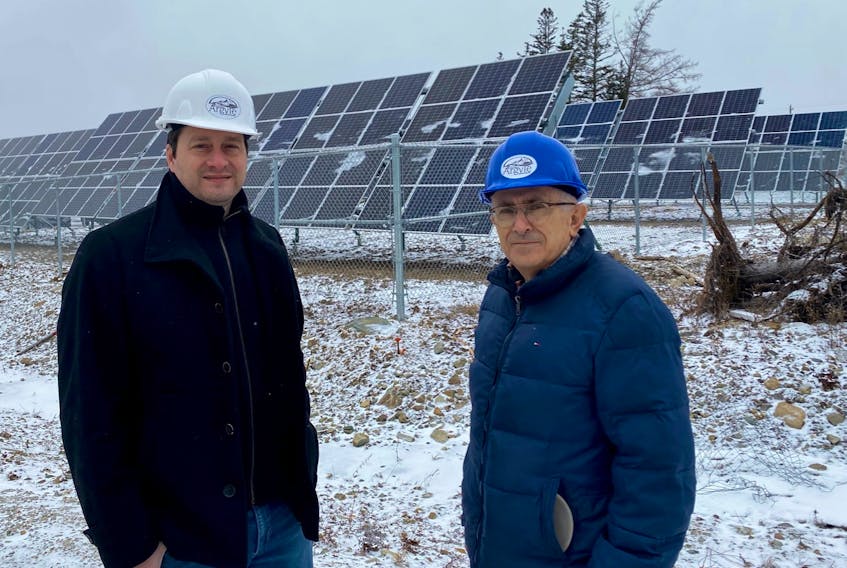 Municipality of Argyle CAO Alain Muise and Warden Daniel Muise predict the solar garden behind the newly constructed administration building could reduce  annual energy cost savings by $27,000.