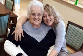 Yarmouth County resident Barb Scoville during a past visit with her mother Janet Rose who lives in a long-term care facility. The two have been separated since mid-March because of the COVID-19 visitor restrictions. CONTRIBUTED