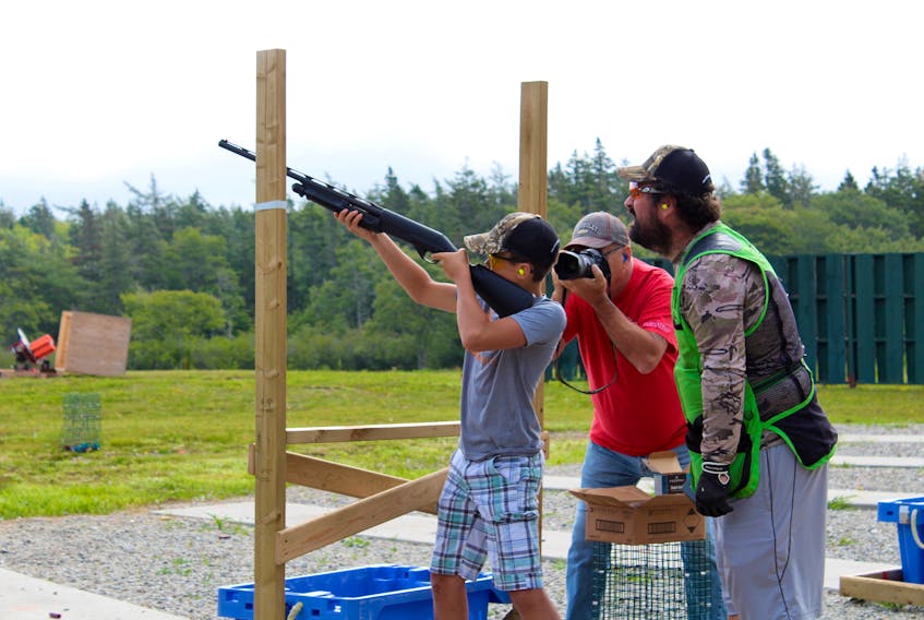 An event held Aug. 10 at the Highland Gun Club in Yarmouth County was a chance for participants to try their hand at clay pigeon shooting. Justin Hines (right) was one of the day’s instructors.