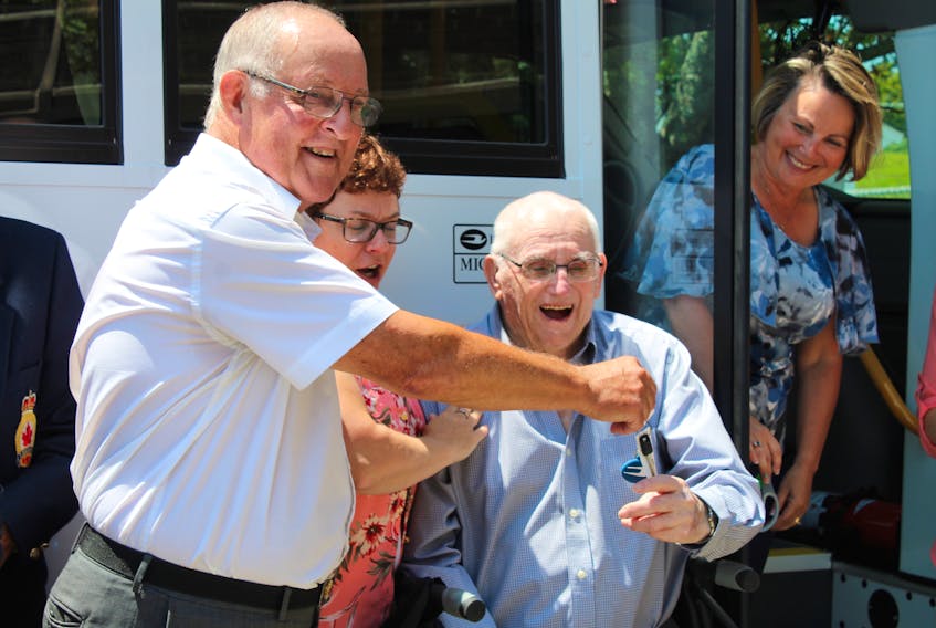 A happy moment at Veterans Place in Yarmouth. Don McCumber (far left) presents the key to the long-term care facility’s new van to Miff O’Connell, a Veterans Place resident and veteran of the Second World War, who was involved in the van campaign and helped get it going last year with a $1,000 donation. Also pictured during the July 16 event celebrating the new vehicle are Carol Cottreau (between McCumber and O’Connell), recreation facilitator at Veterans Place, and Melanie Kennedy (right), former Veterans Place administrator.