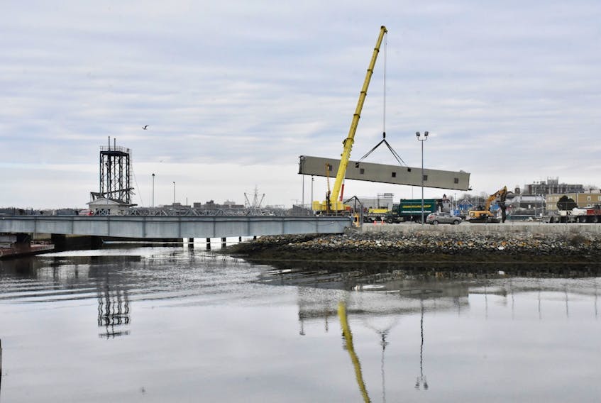 After many years of not being used, the last piece of the passenger gangway was taken down at the Yarmouth ferry terminal on Feb. 25 as part of redevelopment of  the terminal site. TINA COMEAU PHOTO