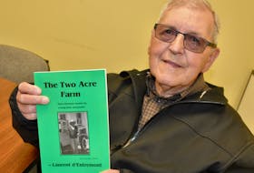 Author Laurent d’Entremont with his latest book: The Two Acre Farm.