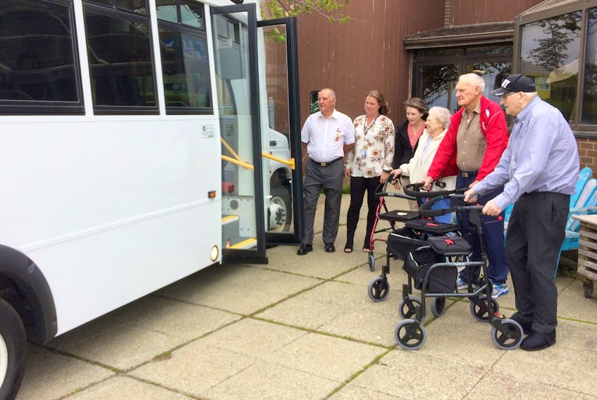 Getting a look at the new Veterans Place van on the day of its delivery to the long-term care facility in Yarmouth (from left): Don McCumber, chair of the fundraising campaign for the van, Hayley Ryan, nurse manager at Veterans Place, Jenelle d’Entremont, recreation therapist at Veterans Pace, and three residents of Veterans Place: Beatrice Cottreau, Owen Atkinson and Miff O’Connell.
