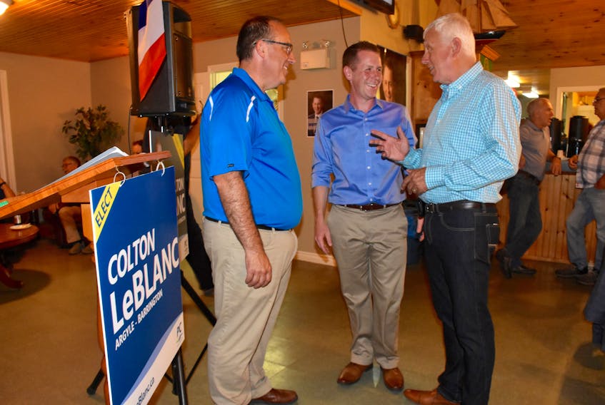 During a celebration evening at the West Pubnico Golf Course clubhouse, Progressive Conservative candidate Colton LeBlanc chats with former riding PC MLAs Chris d’Entremont and Neil LeBlanc after winning the Argyle-Barrington riding in the Sept. 3 by election. TINA COMEAU PHOTO