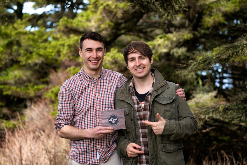 Chad Comeau (left), game designer, and Marc d’Entremont, graphic designer, have teamed up to create À tchi?, a new Acadian card game based on old names and local tradition.