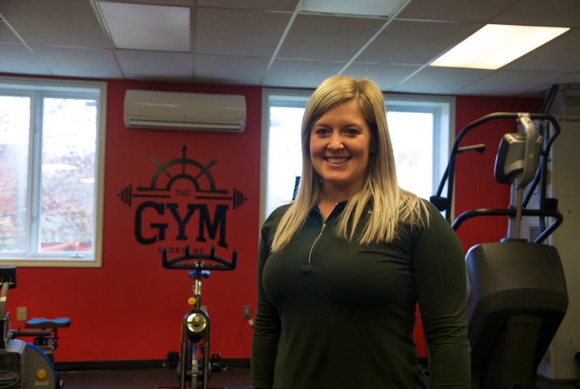 Vanessa Pulley stands in front of The Gym, her newest fitness venture, which turns 1 year old December 3. SARA ERICSSON