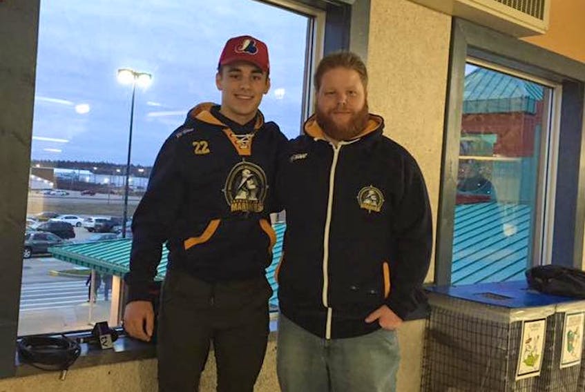 Kevin Northup (right) poses for a photo with Yarmouth Mariners player Ben Chipman at the conclusion of this past hockey season. Northrup has been named the new director of communications for the MHL.