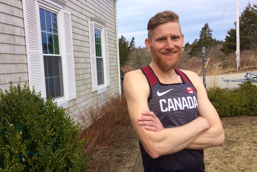 Ian Cunningham at his home in the Dayton area of Yarmouth County, prior to a training run.