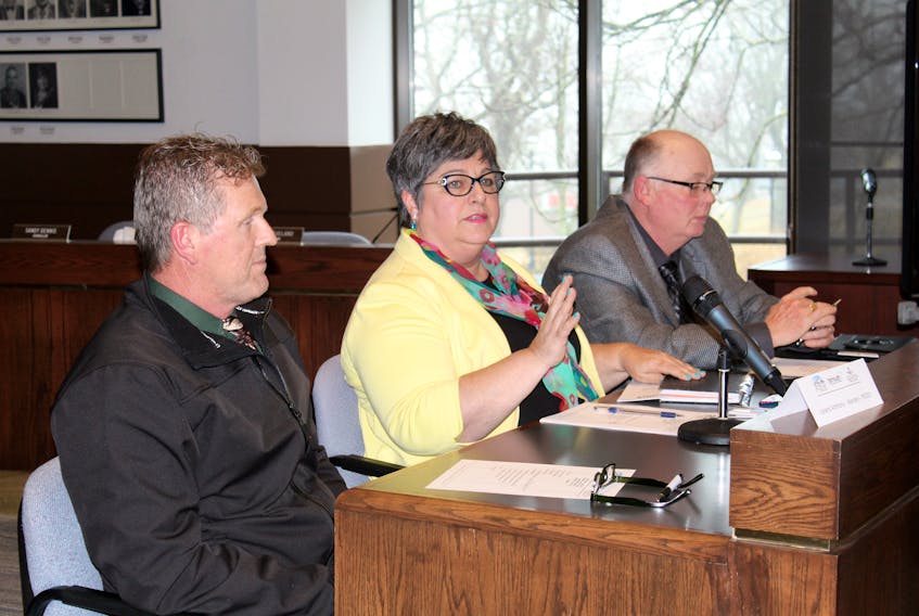 Yarmouth Mayor Pam Mood speaks during a joint council meeting of the Town of Yarmouth, Municipality of Yarmouth and Municipality of Argyle. Mood chaired the April 4 session at the town hall. Flanking her are John Cunningham (left), Yarmouth municipal deputy warden, and Richard Donaldson, the Argyle warden.