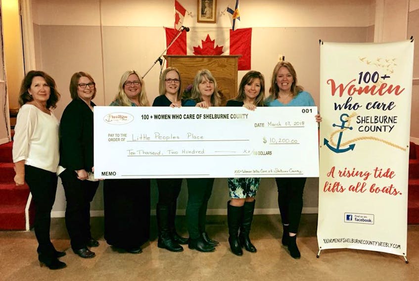 The executive of the group, 100+ Women of Shelburne County Who Care, pose with the recipients of their latest donation of $10,200, made to Erin Locke and Sue Elliott from Little People's Place in Shelburne. From left:  Wanda Mood, Tamara Locke, Pam Mingle, Erin Locke, Sue Elliott, Penny Smith and Suzy Atwood.