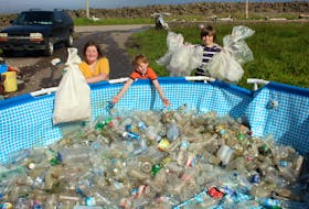 Rhynda, Ian and Brier Tudor from Brier Island have been filling a swimming pool with plastic bottles and other garbage they’ve collected while cleaning up the coastline around this part of Digby County.