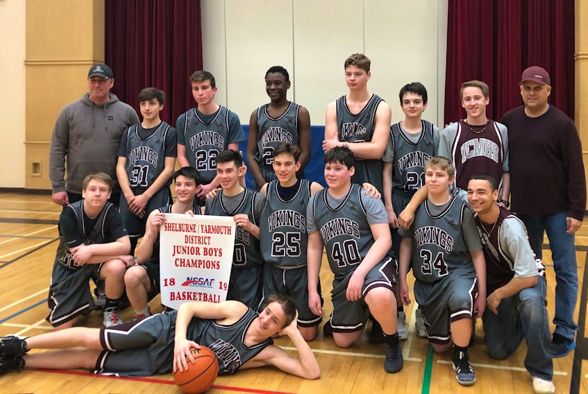The Yarmouth team after winning the junior boys district basketball championship March 6 in Barrington.