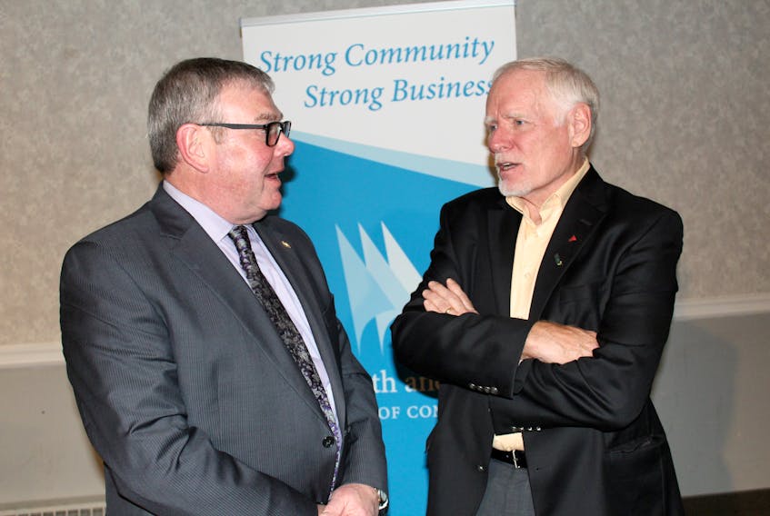 Neil Rogers (left), president of the Yarmouth and Area Chamber of Commerce, chats with Don Mills, chairman and CEO of Corporate Research Associates, March 7 at the Rodd Grand Hotel after the chamber’s annual general meeting. Mills was the evening’s guest speaker.