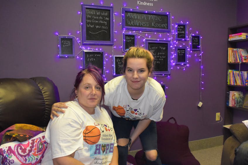 Kelly Mitchell, mother of Aidaen Mae Mitchell, and Laura Hanlon, who was a friend of Aidaen's, inside the Aidaen Mae Mitchell Wellness Room that is a component of the Tri County Mental Health and Wellness drop-in centre at 101 Water St. TINA COMEAU PHOTO