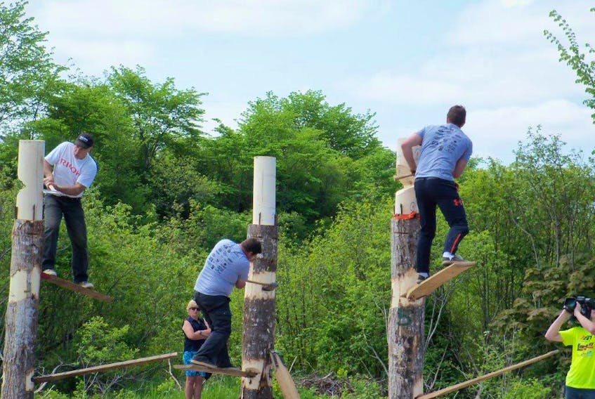 Competitors compete in the springboard chop at the Nova Scotia Lumberjack Championships last year in Truro. This year the event will be held in Barrington on June 16. CONTRIBUTED