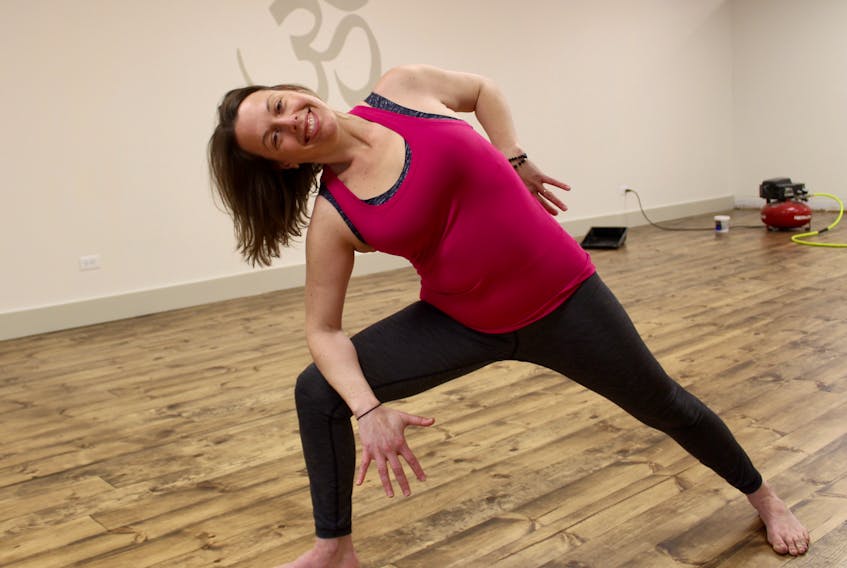 Kate Giglio and her husband Joe are looking forward to moving Supernova Power Yoga back into their downstairs studio. Extensive renovations were required after a Nov. 29 fire on the second level.