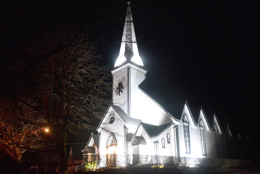A light shines on Eglise Sainte-Pierre in West Pubnico, just as a light shines from the hearts of those in Pubnicos who are always there to help and support one another. TINA COMEAU