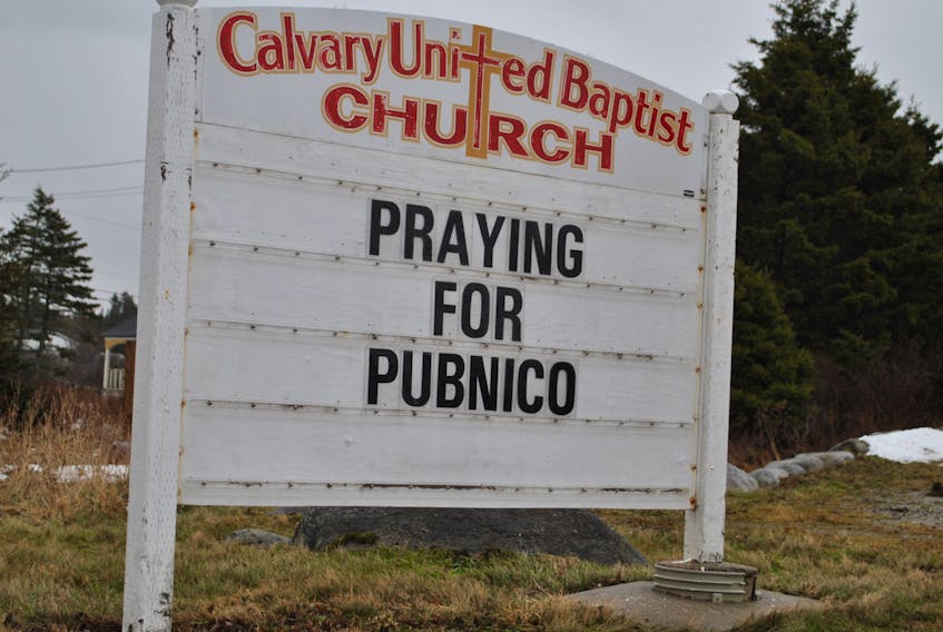 Praying for Pubnico reads the sign outside the Calvary United Baptist Church in Woods Harbour.