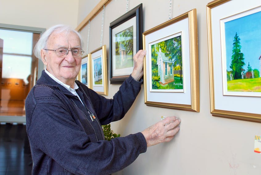 Father Maurice LeBlanc has paintings on display at the Par-en-Bas school community centre in Tusket. The January/February exhibition features 28 pieces by the well-known Yarmouth County artist.