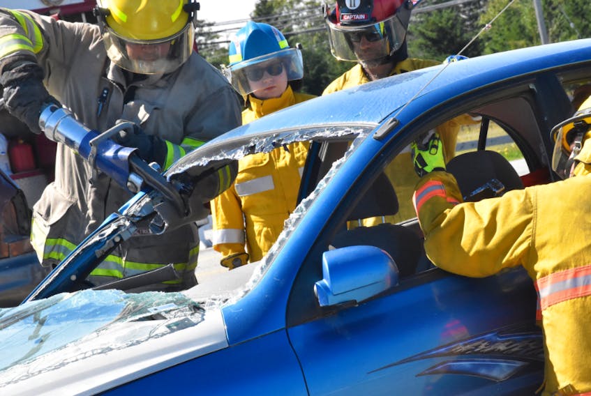 An extrication demonstration at an firefighters Family Fun Day held before in Yarmouth. TINA COMEAU PHOTO