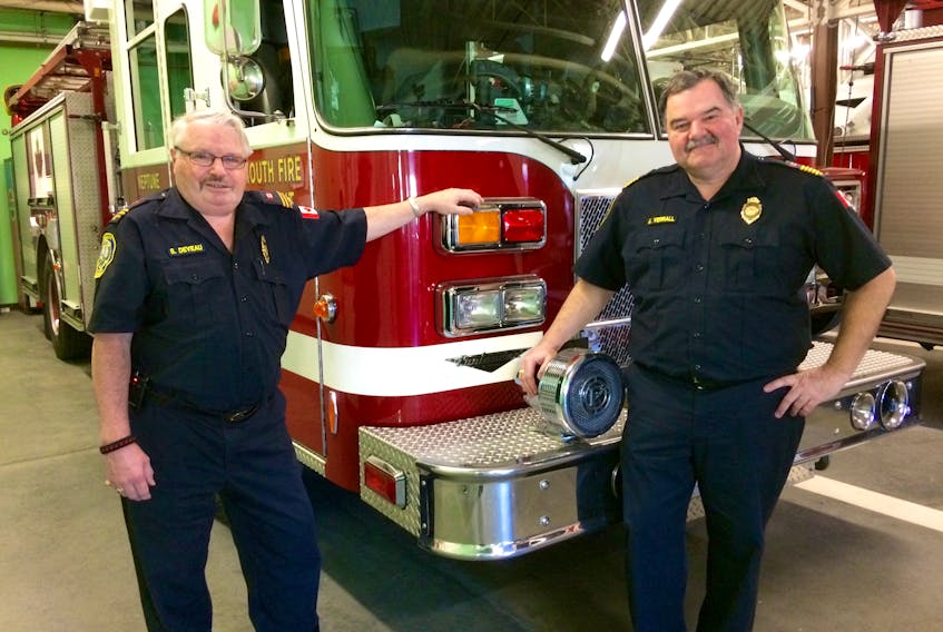 Stewart Deveau (left), chief fire prevention officer with the Yarmouth Fire Department, and Yarmouth Fire Chief John Verrall.
